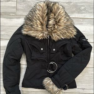 Jacket with faux fur collar and sleeves.